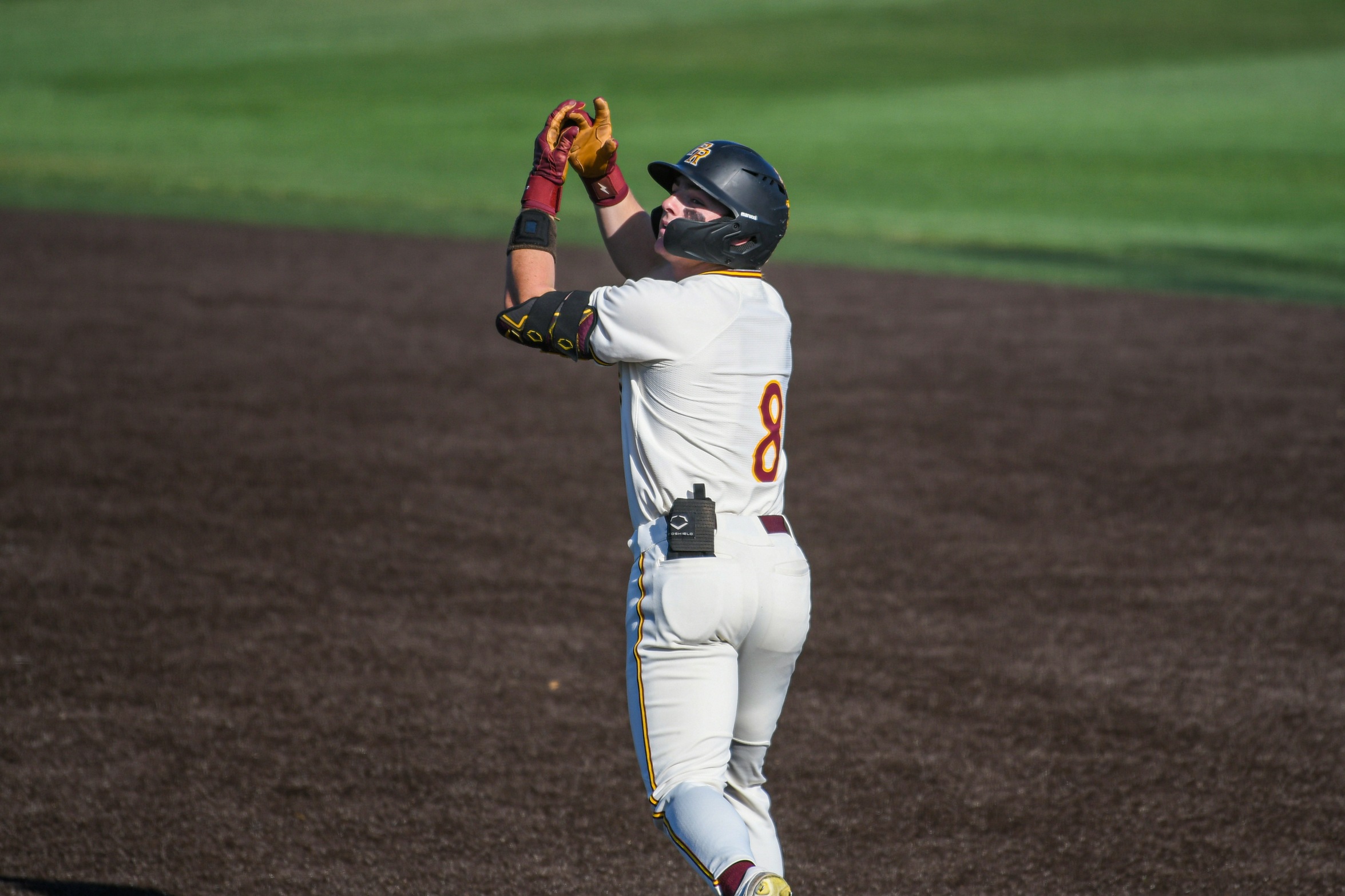Jackson Hood (Madison; Germantown) celebrates as he rounds first base after smashing a two-run home run against Gulf Coast (Melany Carrasco/PRCC Athletics).