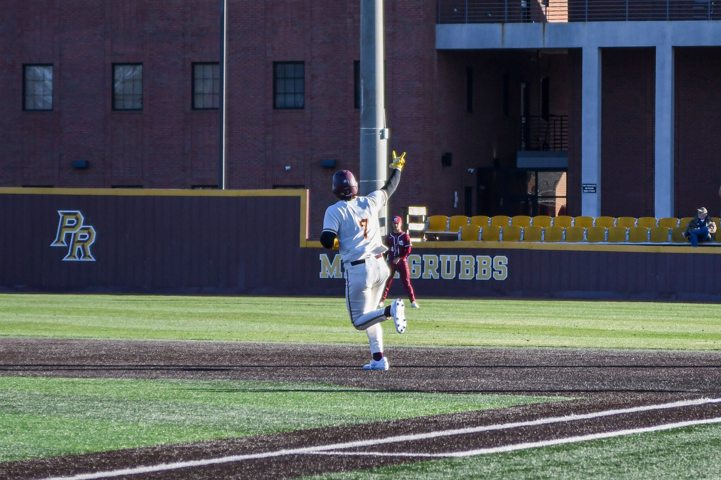 Coy Clements (Hattiesburg; Oak Grove) salutes right field fans after bashing a two-run homer against Coastal Alabama - South (Grace Kesler/PRCCAthletics).