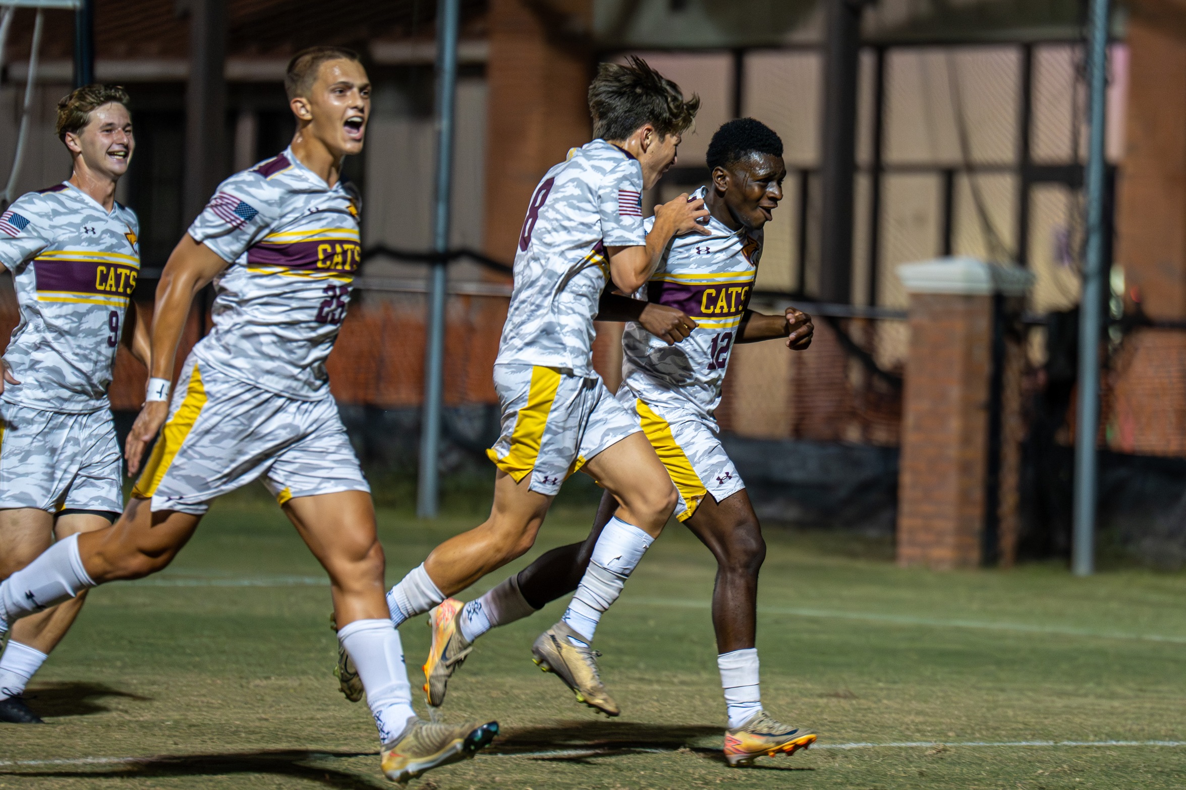 Zach Howard (Ocean Springs) and teammates celebrate following his game-opening goal. (Karisa Watkins/PRCC Athletics).