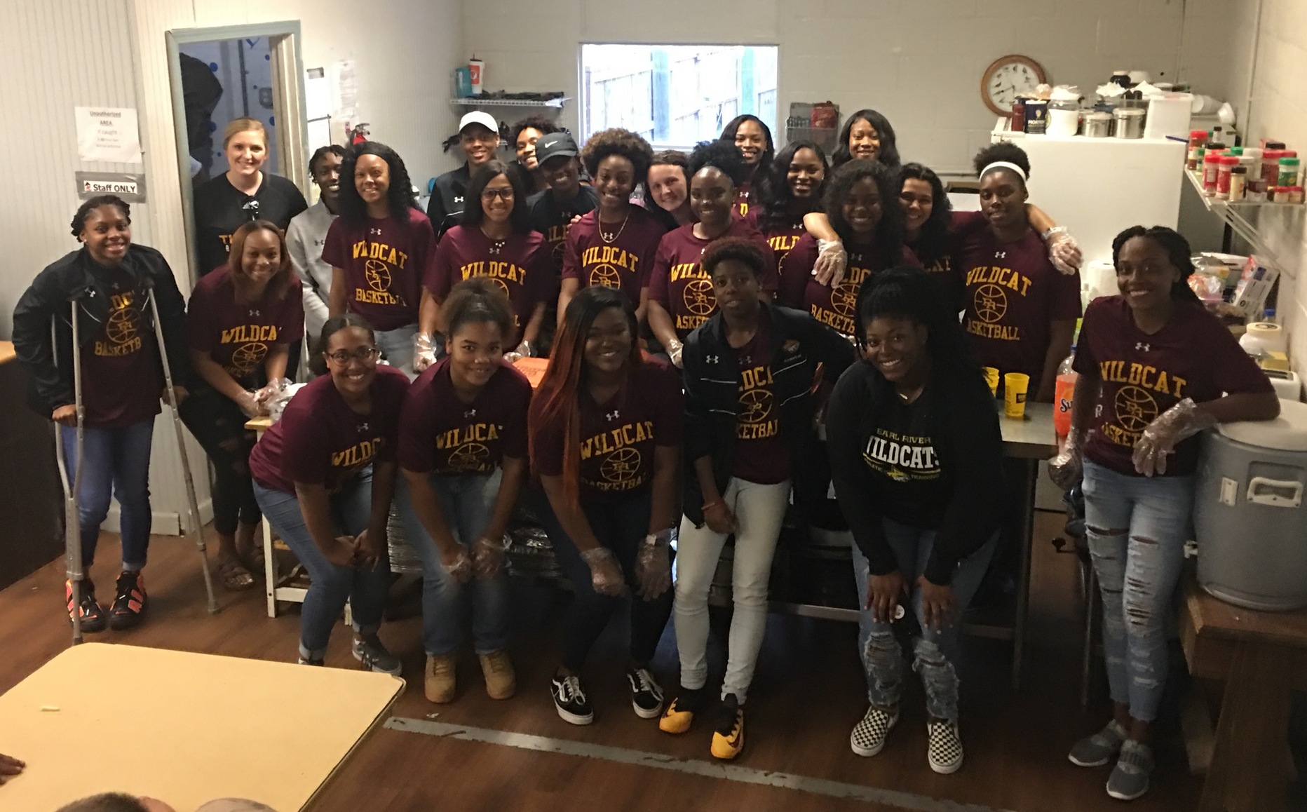 Lady Wildcats give back to community on eve of season opener