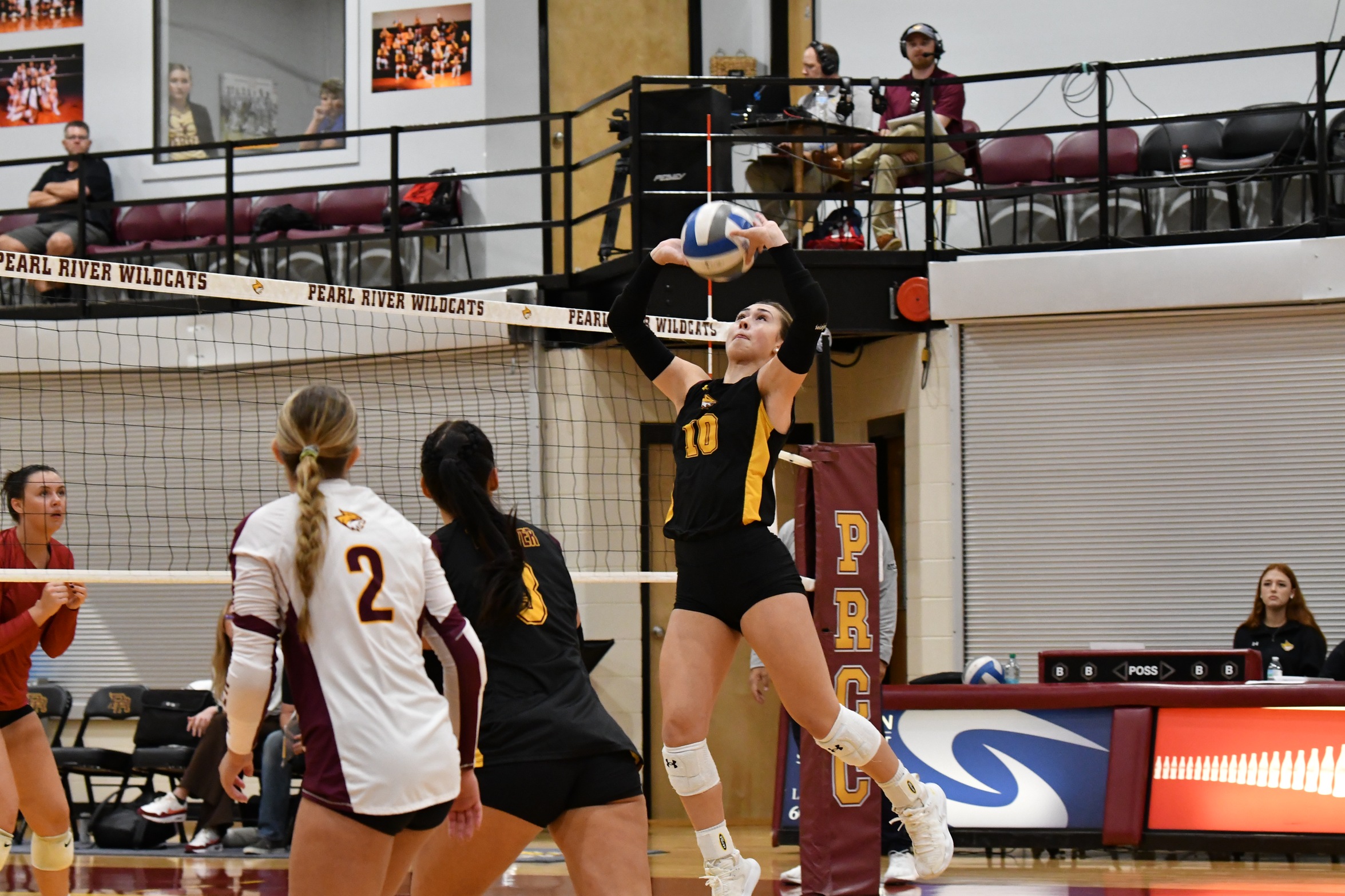 Skyla Rann (Gonzales, La.; East Ascension) sets a teammate for an attack attempt. (Hannah Mills/PRCCAthletics)