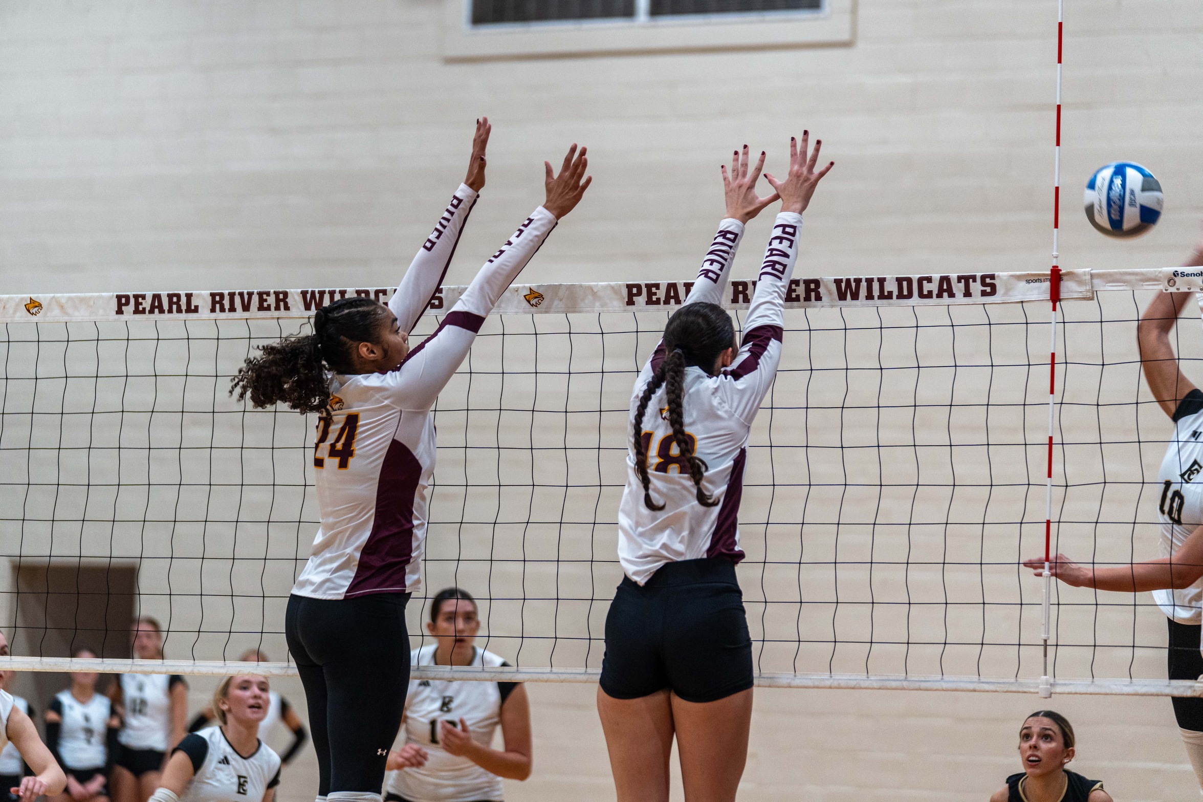 Reagan Ziegler (Lacombe, La.; Lakeshore) and Mallory Hesterman (Brooklyn; HomeLife Academy) attempt to block an East Central attack. (Grace Kesler/PRCCAthletics)